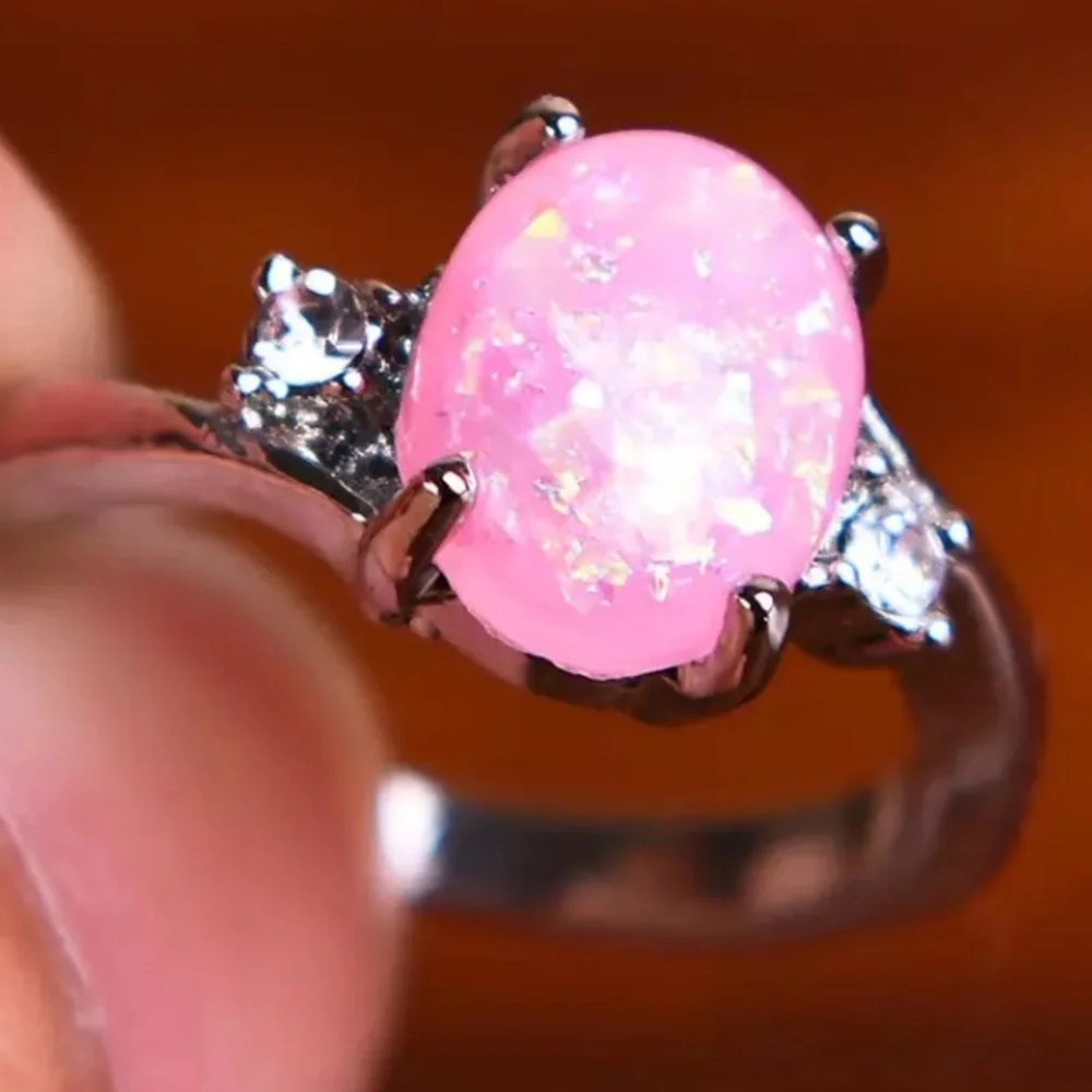 BRAND NEW.925SS OVAL CUT PINK OPAL RING